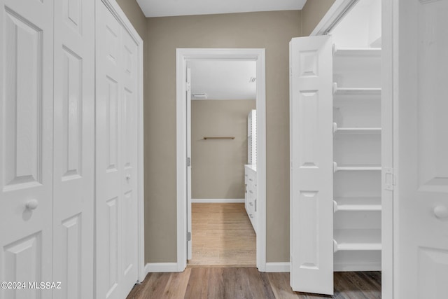 hall featuring hardwood / wood-style flooring