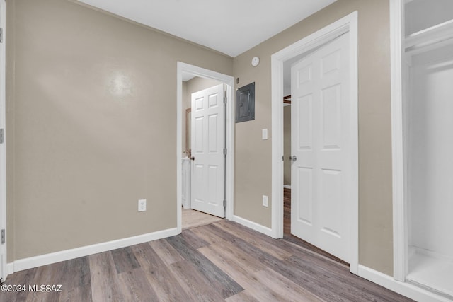 unfurnished bedroom featuring hardwood / wood-style floors