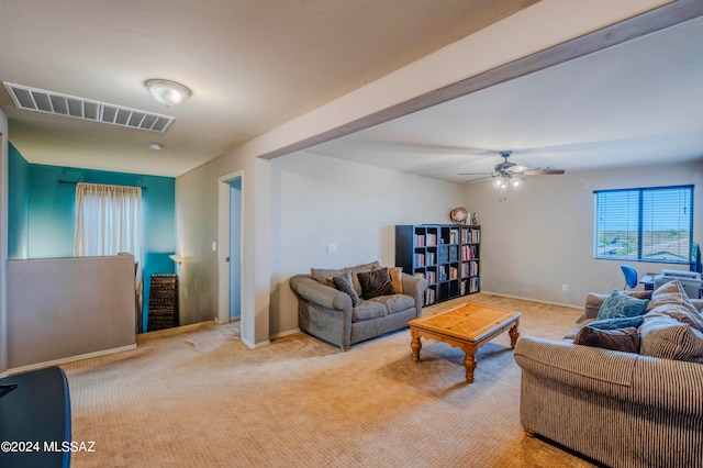 living room with light colored carpet and ceiling fan