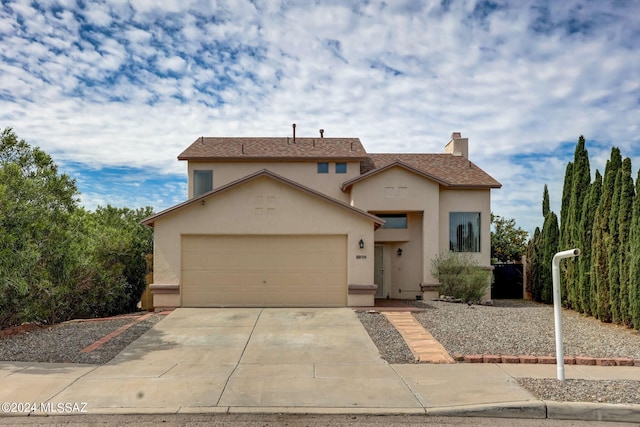 front facade with a garage