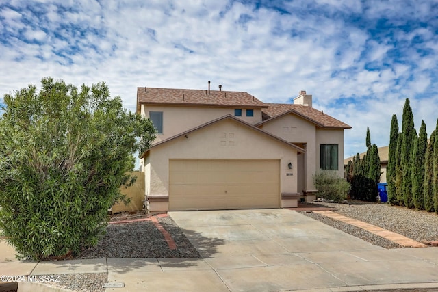 view of front of home with a garage