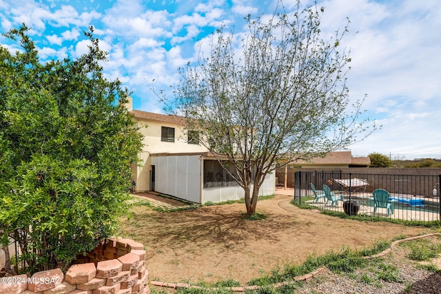 view of yard featuring a covered pool