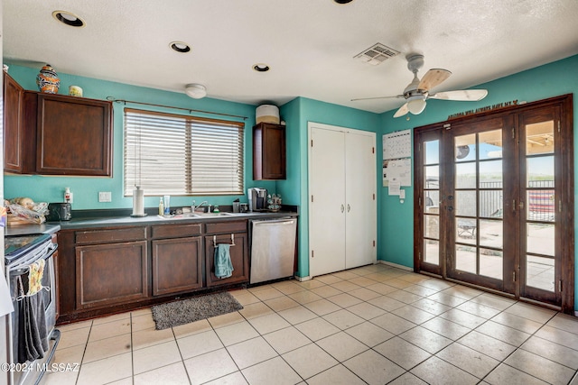 kitchen with plenty of natural light, range, ceiling fan, and dishwasher