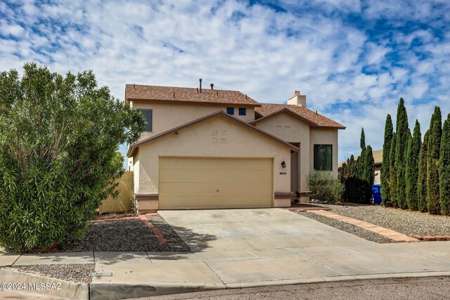 view of front of property featuring a garage