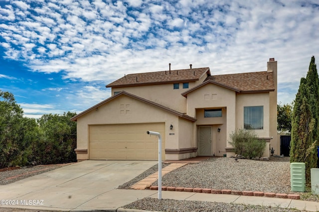 view of front of property featuring a garage