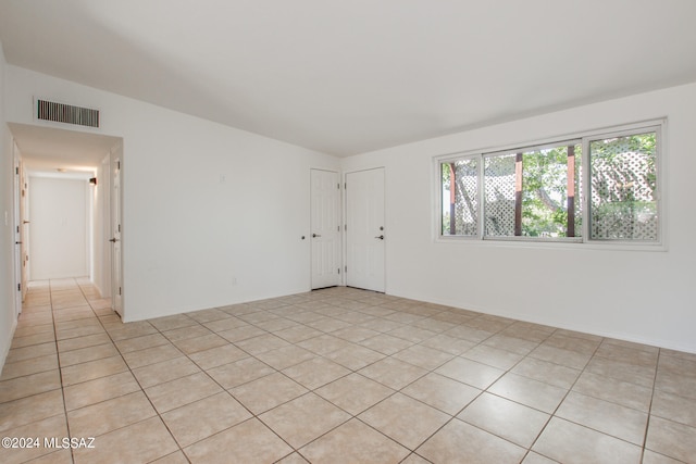 view of tiled spare room