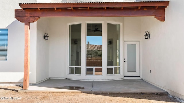 doorway to property with a patio area