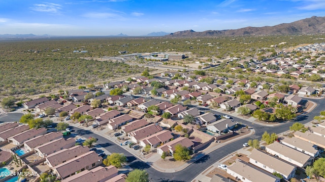 birds eye view of property featuring a mountain view