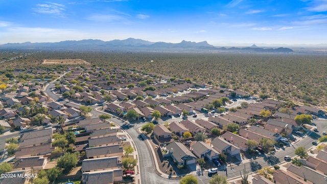 birds eye view of property with a mountain view