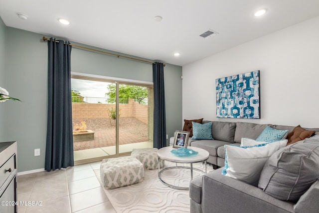 living room with light tile patterned floors