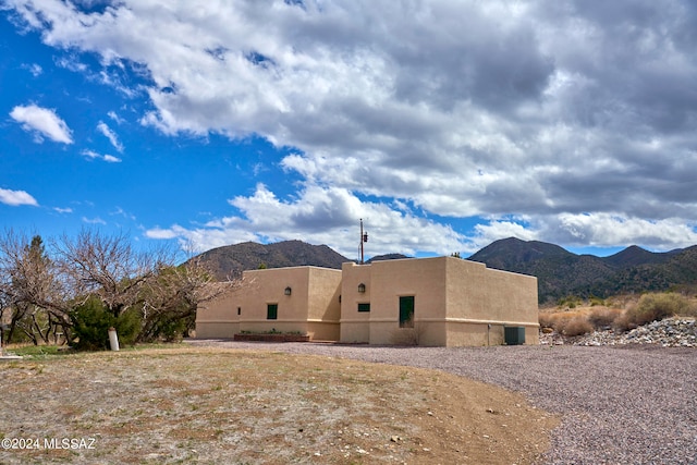 exterior space with a mountain view