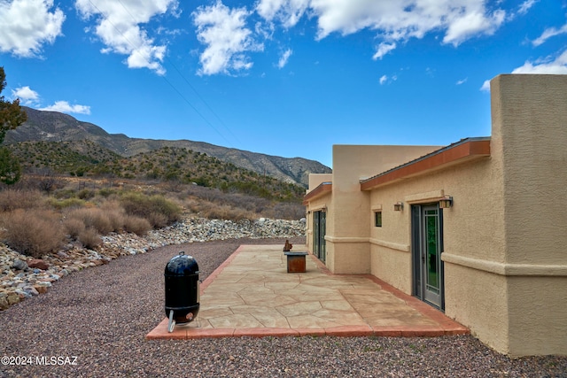 view of patio with a mountain view