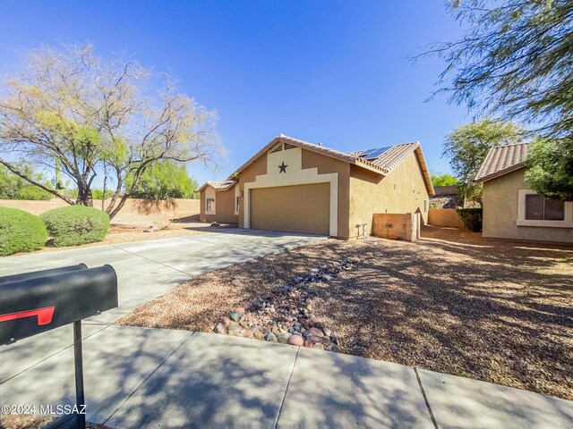 view of front of house with a garage