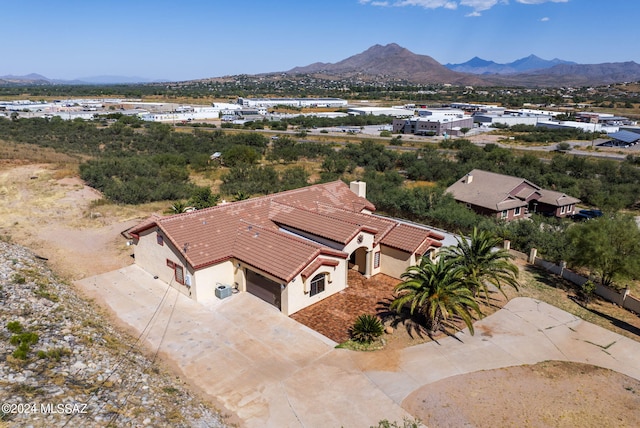 drone / aerial view featuring a mountain view