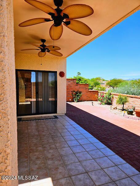 view of patio with ceiling fan