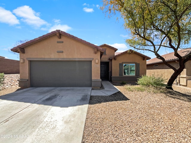 view of front of home with a garage