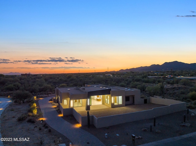 exterior space featuring a mountain view