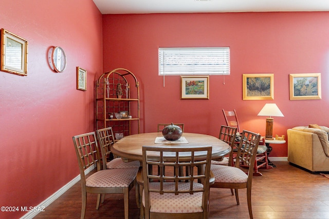 dining room with hardwood / wood-style floors