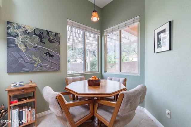 dining area with light tile floors