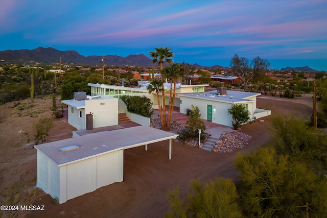 aerial view at dusk with a mountain view