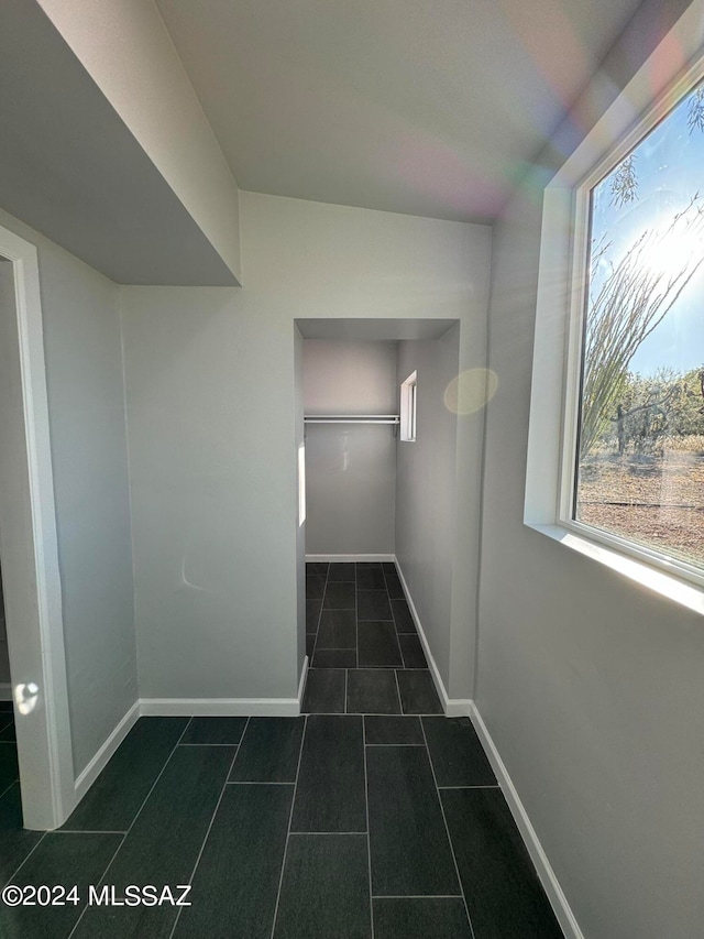 interior space with dark tile patterned floors