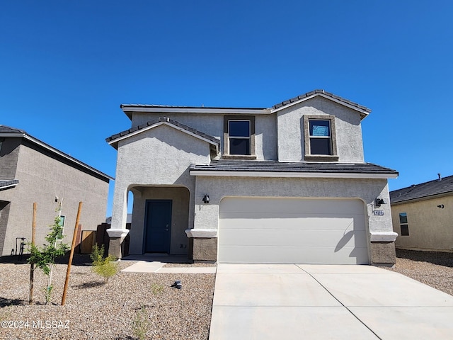 view of front of house with a garage