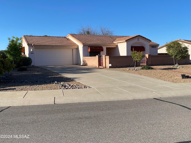 ranch-style house with a garage