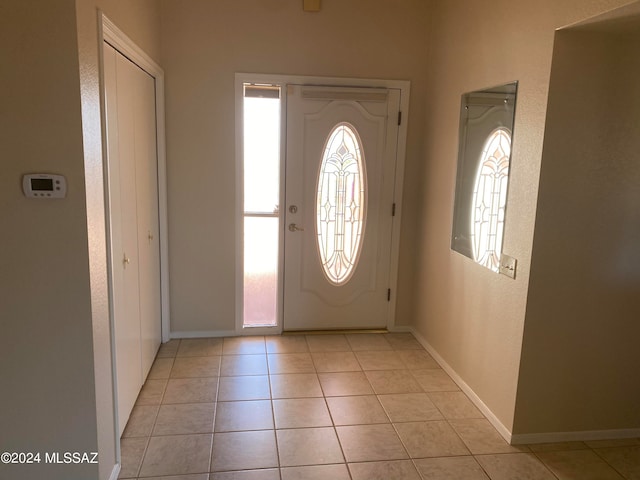 foyer with light tile patterned floors