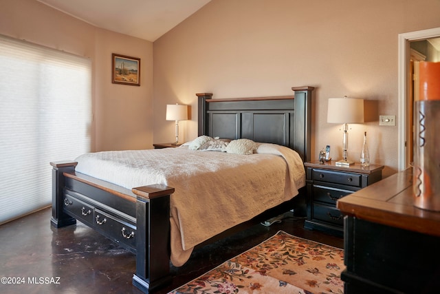 bedroom featuring lofted ceiling