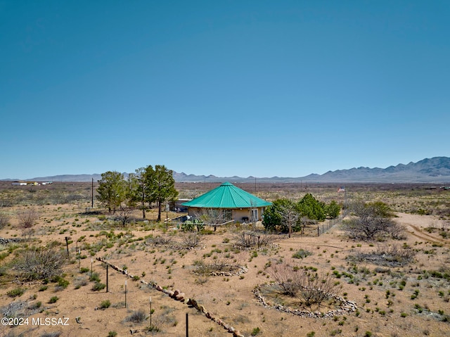 view of mountain feature featuring a rural view