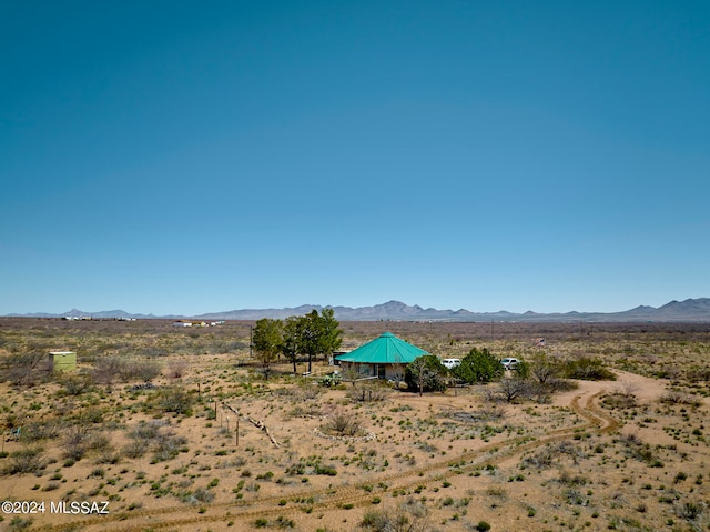 view of mountain feature featuring a rural view