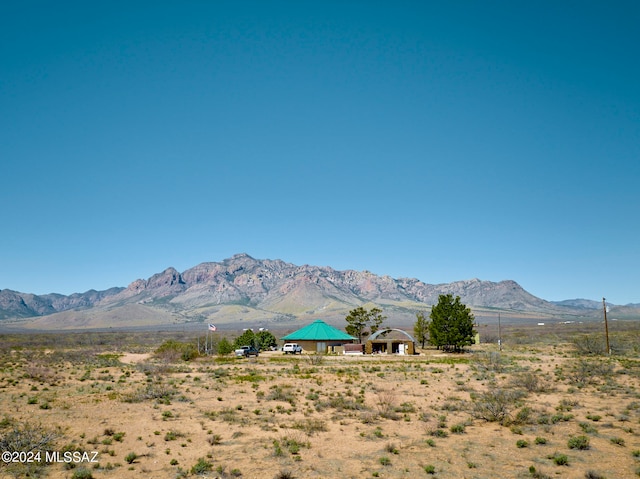 mountain view featuring a rural view