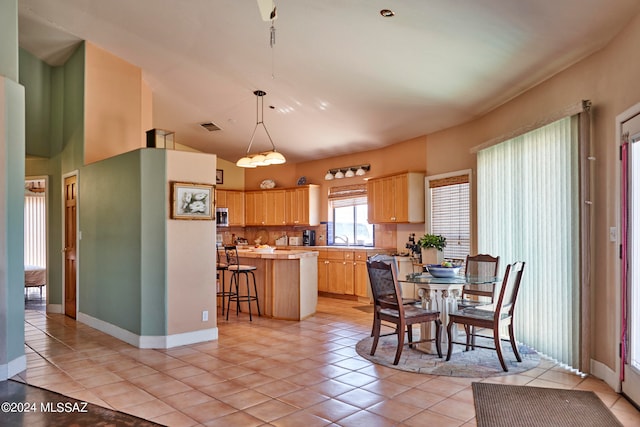 interior space featuring sink and light tile floors