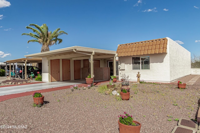 view of front of house featuring a carport