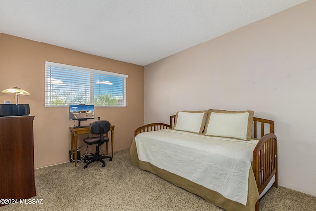 bedroom with light carpet