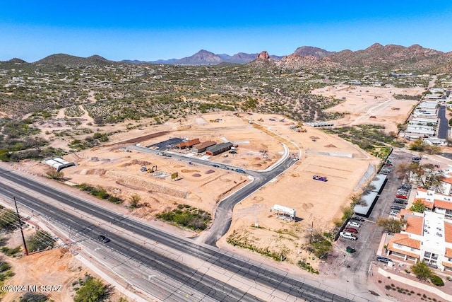 birds eye view of property featuring a mountain view