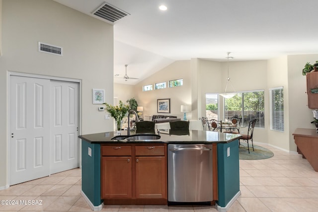 kitchen with a kitchen island with sink, sink, light tile patterned floors, stainless steel dishwasher, and ceiling fan