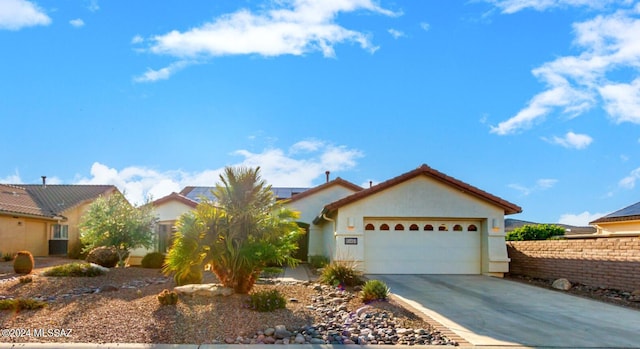 view of front of home with a garage