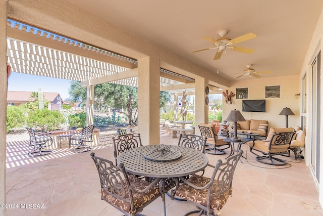 view of patio / terrace with a pergola and ceiling fan