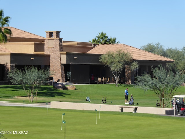 view of community with a yard