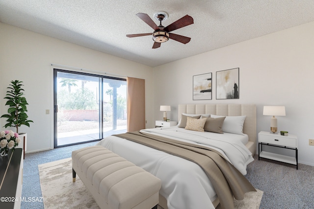 carpeted bedroom with a textured ceiling, ceiling fan, and access to exterior