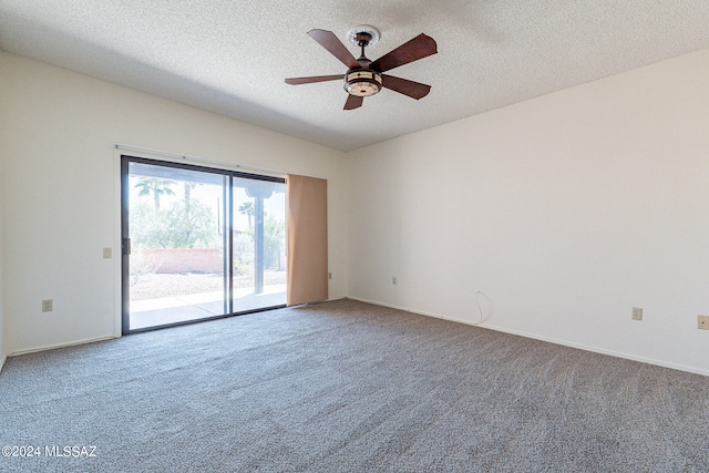 unfurnished room featuring light carpet, ceiling fan, and a textured ceiling