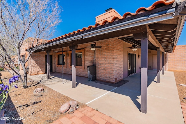 exterior space with a patio area and ceiling fan