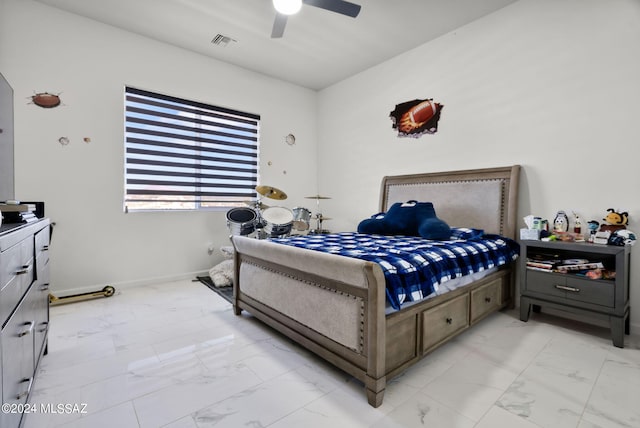 bedroom with ceiling fan and light tile floors