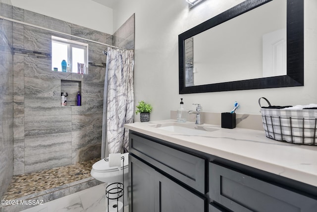 bathroom featuring walk in shower, toilet, tile floors, and vanity