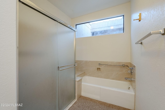 bathroom featuring a tub