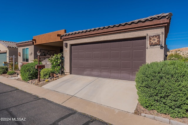 view of front of home featuring a garage