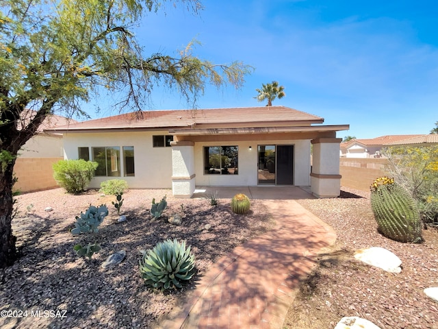 back of house featuring a patio