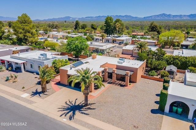 drone / aerial view featuring a mountain view