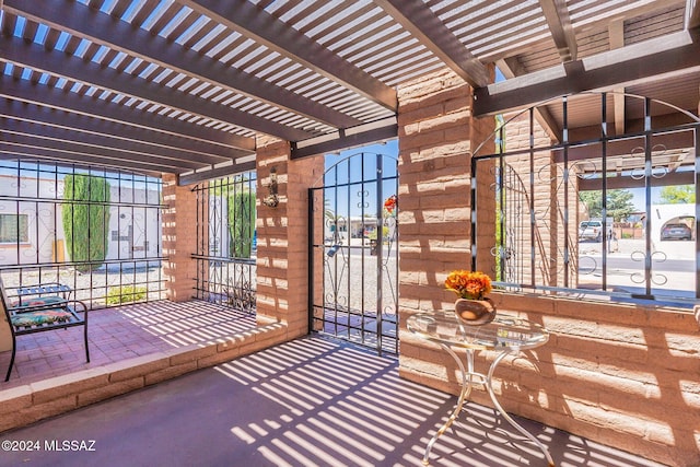 view of patio / terrace featuring a gate and a pergola